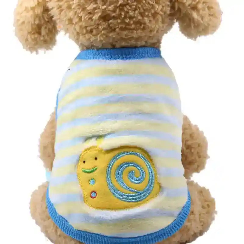 Plush dog wearing soft blue and yellow striped sweater with embroidered smiling snail design
