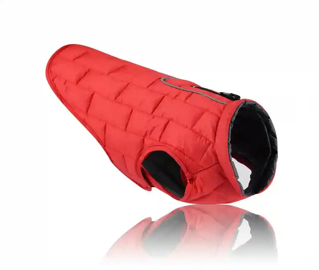 Red quilted dog jacket with gray lining and armholes on white background