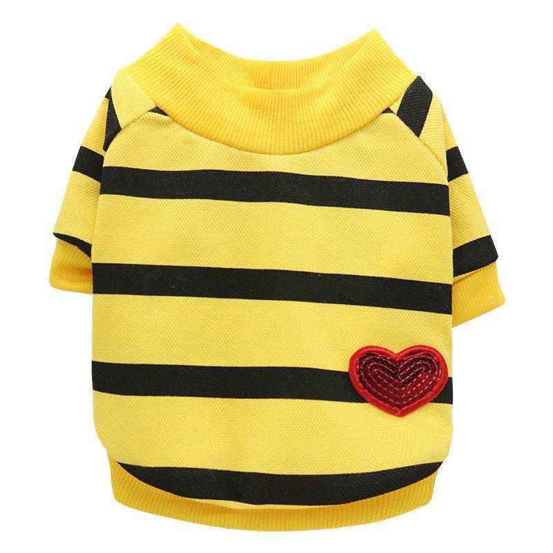 Yellow pet sweater with black stripes and a red heart patch on the side, knit fabric