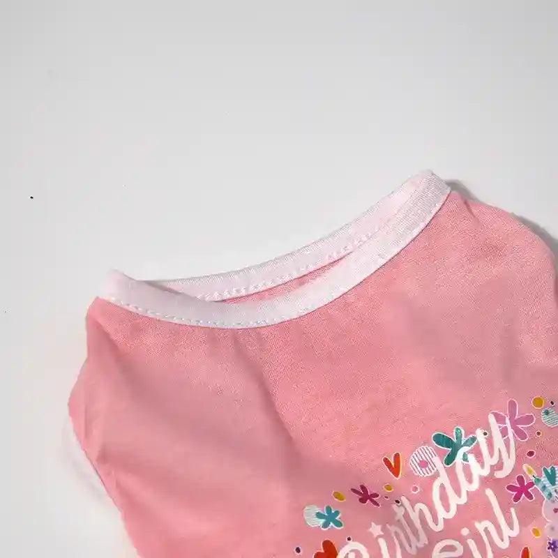 Pink baby girl t-shirt with white trim and colorful birthday design