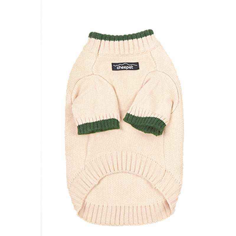 cream knit dog sweater with green trim and chest pet logo patch