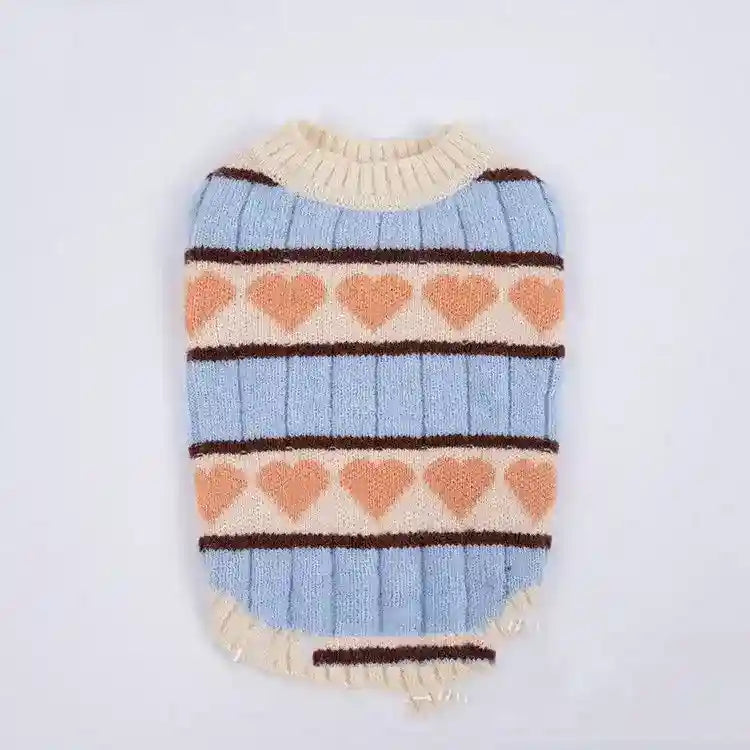 Soft knitted pet sweater with blue stripes, peach hearts, and cream trim on white background
