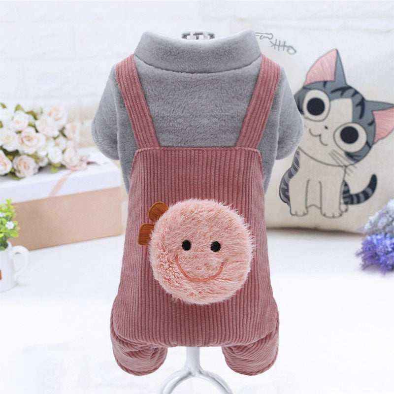 Gray fleece pet sweater with pink corduroy overalls and smiling face plush on back