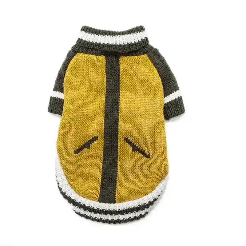Knitted dog sweater in mustard yellow with dark green sleeves and white stripes on cuffs and collar