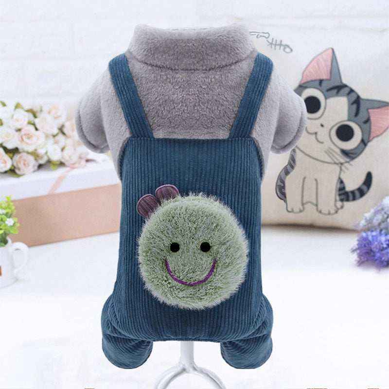 Blue corduroy dog overalls with gray fleece sleeves and smiling green bug patch on back