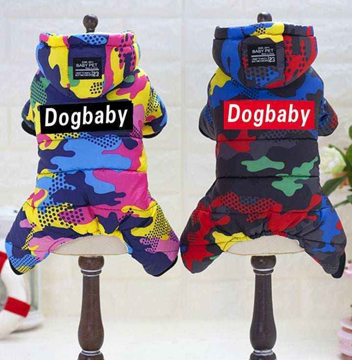 Colorful camouflage dog hooded jumpsuits displayed on wooden stands, labeled Dogbaby pet clothing