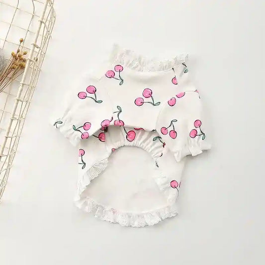 White pet shirt with pink cherry print and lace trim on sleeves and hem