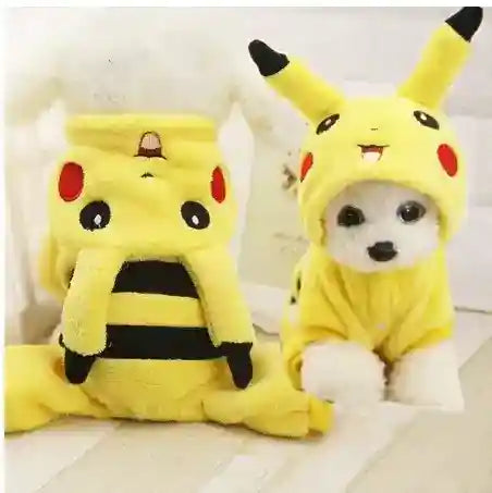 Small white dog wearing yellow Pikachu costume with ears and black stripes, sitting on light wood floor