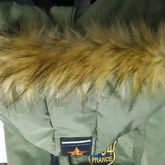 Green winter jacket with brown fur hood trim and France emblem patch