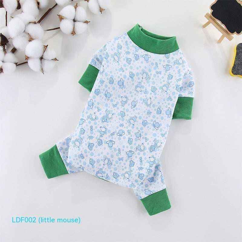 Baby onesie with blue mouse print and green cuffs on white background with cotton branch