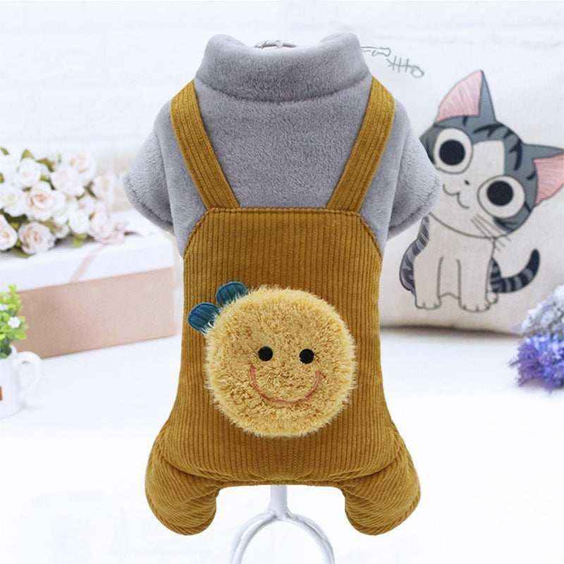 Gray turtleneck pet sweater with mustard yellow corduroy overalls featuring a smiling fuzzy sun patch