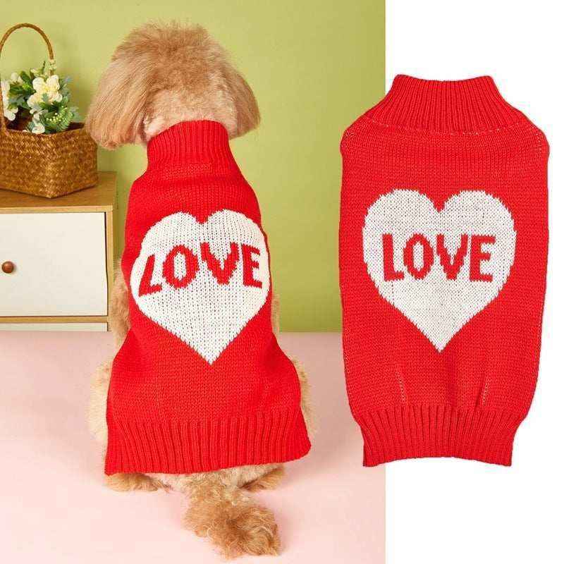 Small dog wearing red knitted sweater with white heart and LOVE text, displayed beside sweater