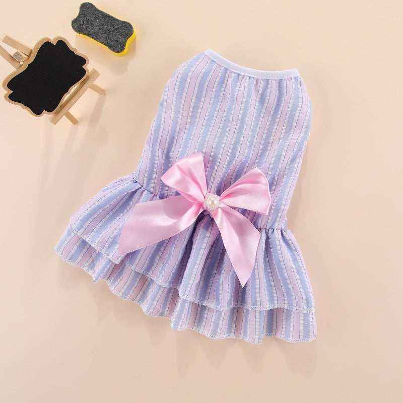 Small pastel blue and pink striped dog dress with ruffled skirt and large pink satin bow