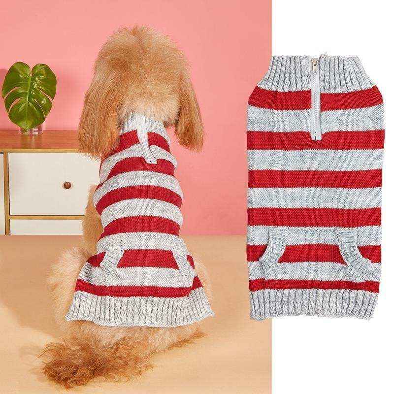 Small dog wearing red and white striped knit sweater with front pocket and zipper on pink background