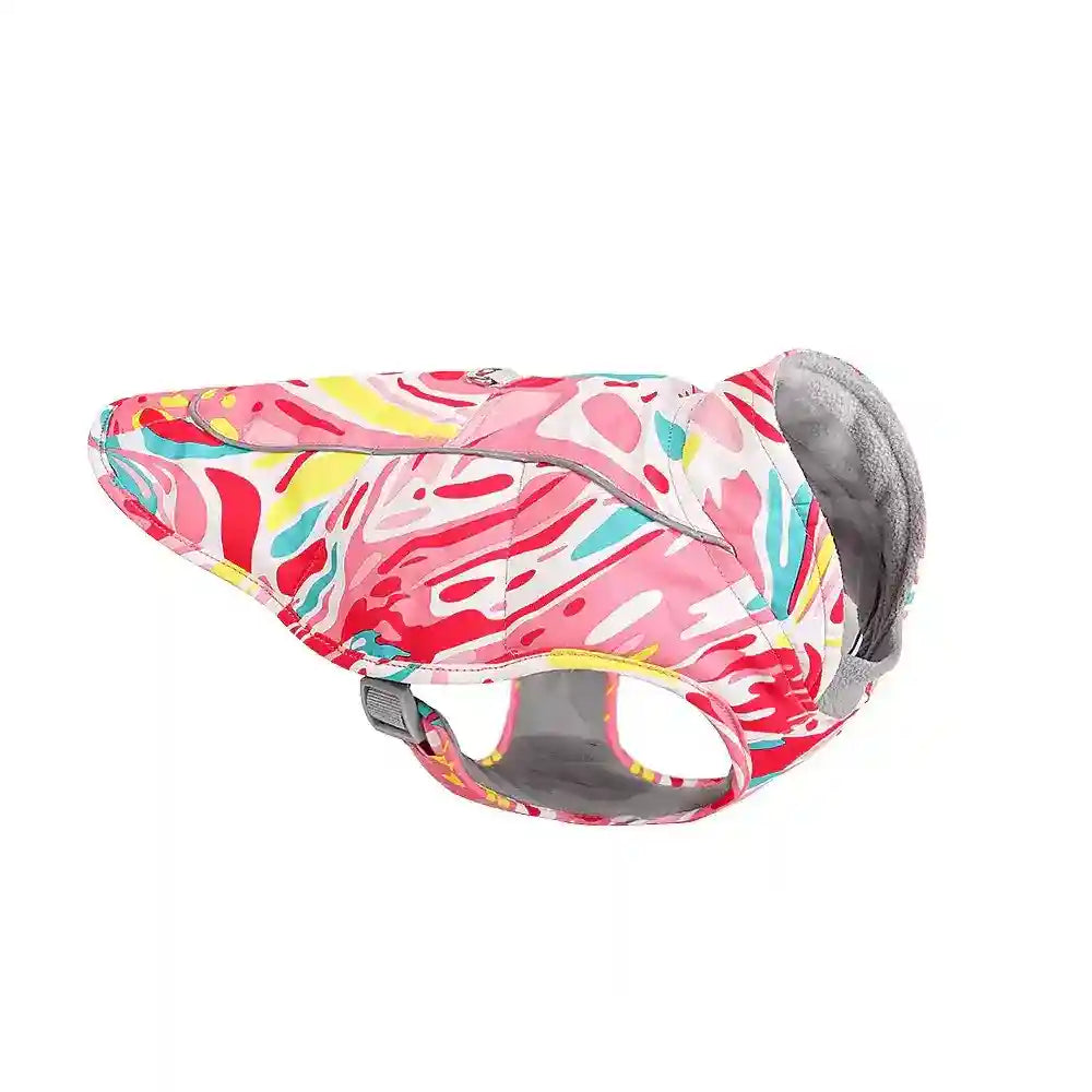 Colorful pink, red, yellow, and blue patterned dog jacket with fleece lining and adjustable strap