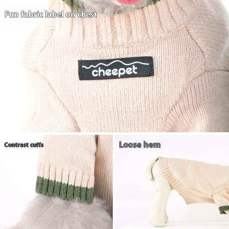 Beige knitted dog sweater with cheepet fabric label, green contrast cuffs, and loose hem on white dog mannequin