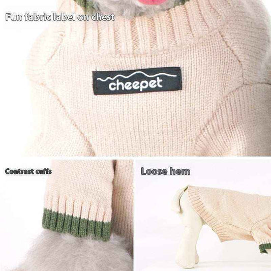 Beige knitted dog sweater with cheepet fabric label, green contrast cuffs, and loose hem on white dog mannequin