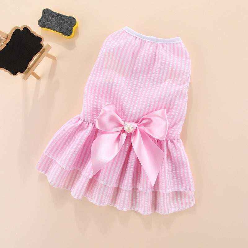 Pink striped dog dress with ruffled skirt and satin bow with pearl embellishment