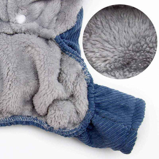 Close-up of blue ribbed cuff and soft gray fleece lining in warm winter clothing fabric