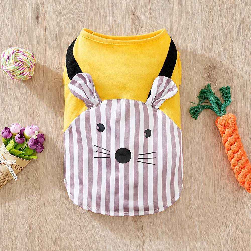 Yellow pet outfit with striped mouse face design, surrounded by rope ball, flowers, and carrot toy
