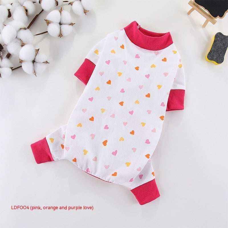 White pet outfit with pink, orange, and purple heart patterns and pink ribbed cuffs and collar