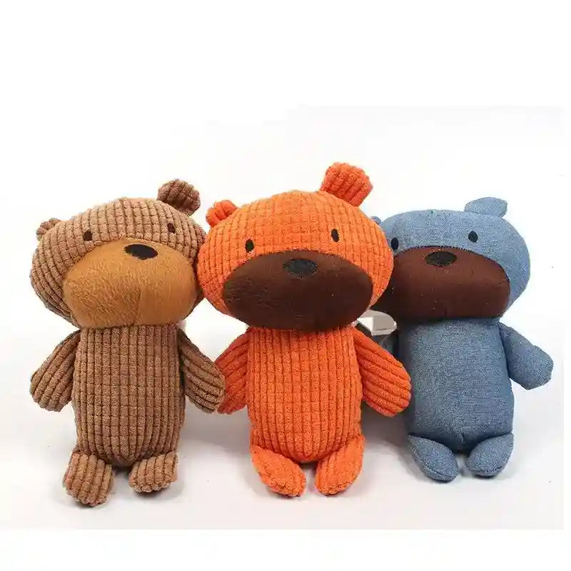 Three soft plush bear toys in brown, orange, and blue corduroy fabric with dark snouts