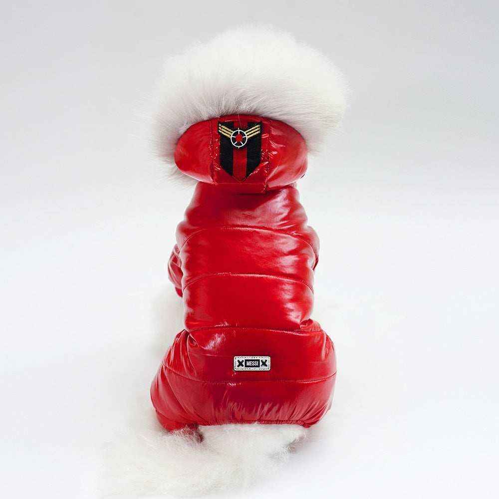 Small dog wearing shiny red puffer jacket with white fur hood and Messi label