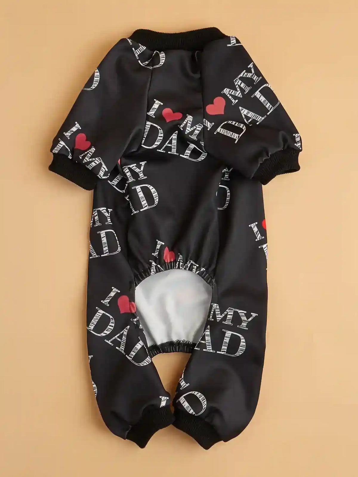 Black pet jumpsuit with white "I love my dad" text and red heart print, ribbed cuffs