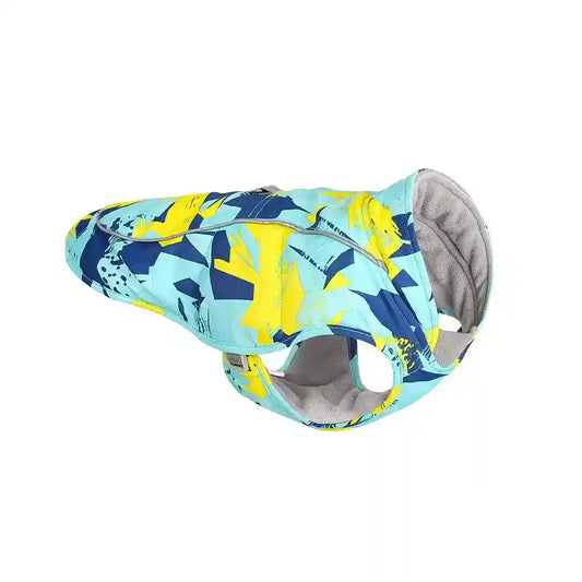 Colorful dog jacket in blue, yellow, and navy with a soft grey fleece lining