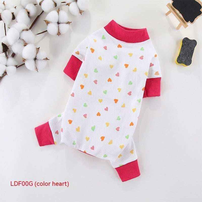 White pet jumpsuit with multicolor heart prints and red collar and cuffs on white background