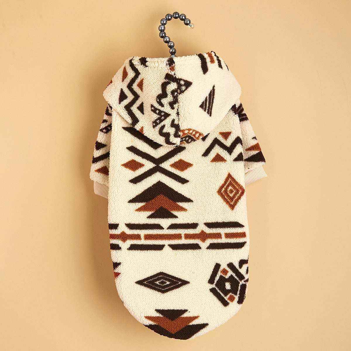 Cozy fleece pet hoodie with black and brown geometric pattern on beige background