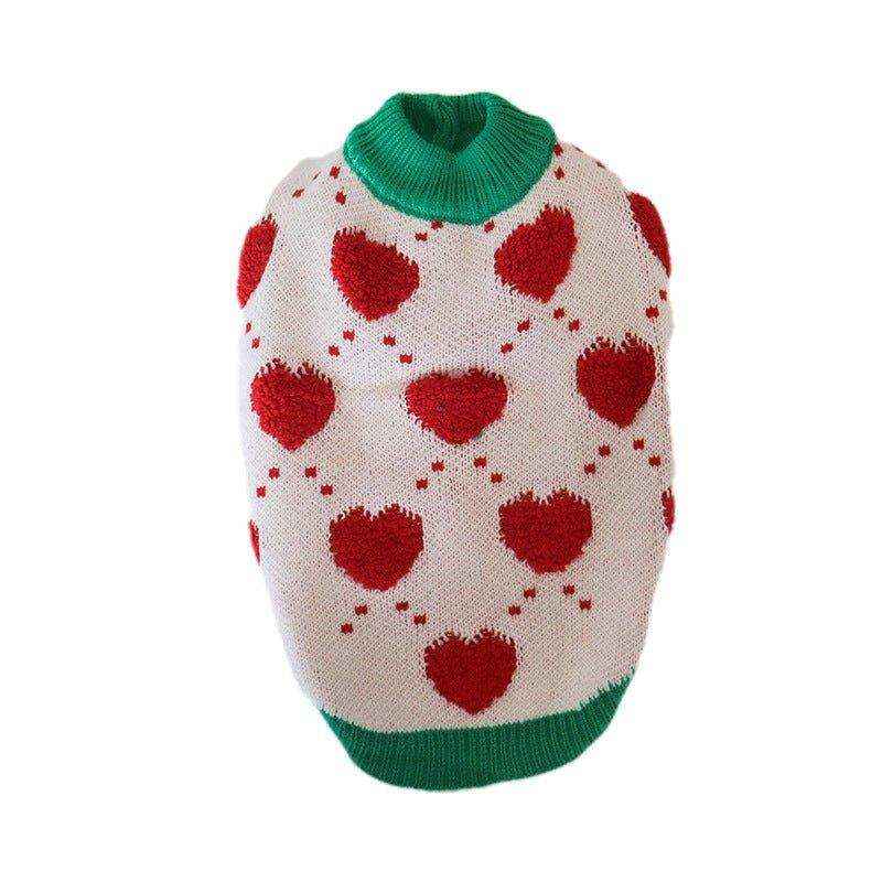 White dog sweater with red hearts and green collar and hem, cozy pet clothing