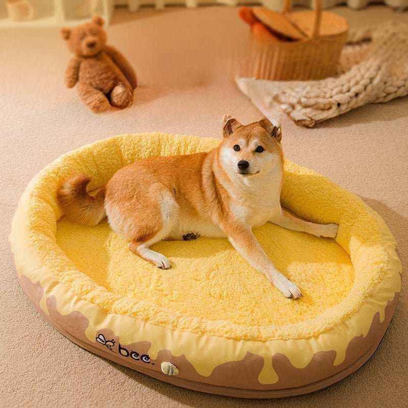 Shiba Inu dog lying on a yellow honeycomb-patterned plush dog bed with bee design