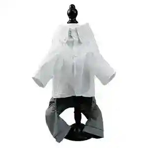 Small mannequin dressed in white button-up shirt and gray pants against white background
