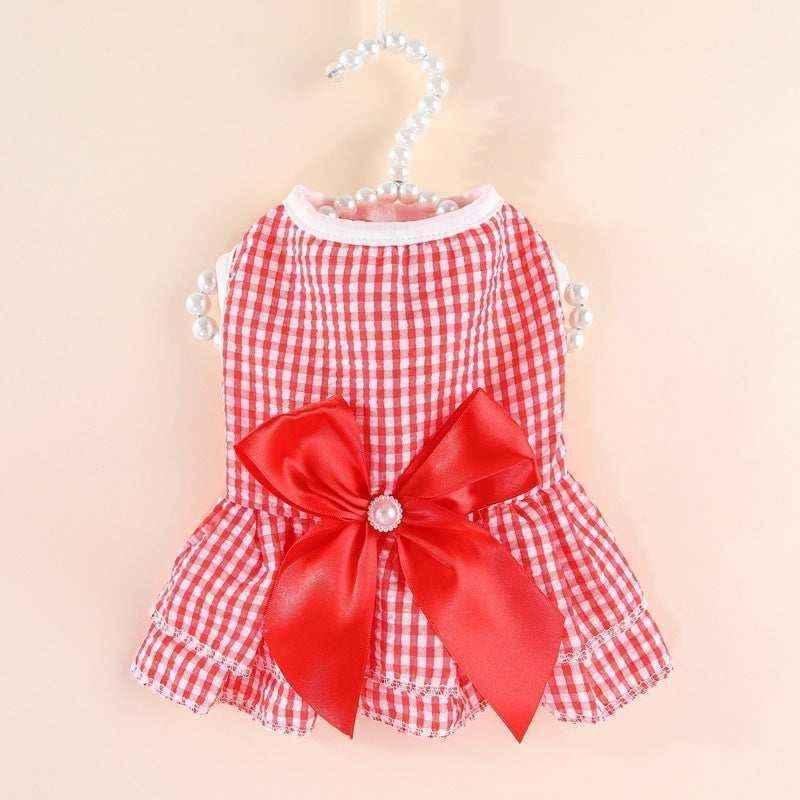 Red and white gingham dog dress with large red satin bow on pearl hanger