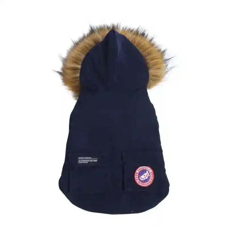 Navy blue dog winter coat with faux fur hood trim and two front pockets, one with a circular patch