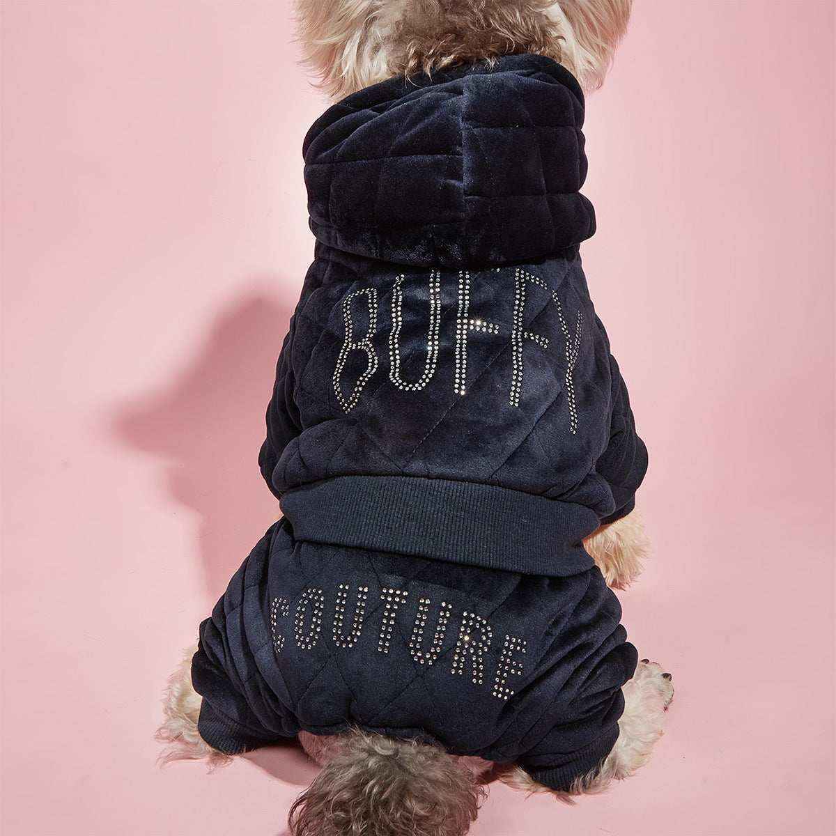 Small dog wearing navy blue quilted hoodie and pants with rhinestone embellished BUBFY COUTURE text