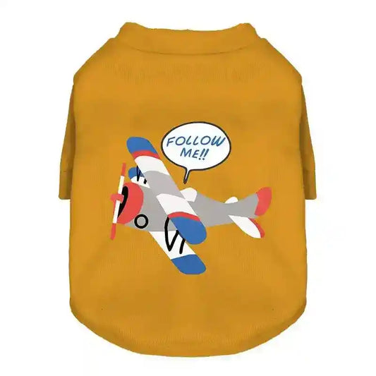 Mustard yellow dog sweater with cartoon airplane and speech bubble saying Follow Me