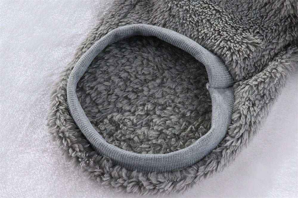 Close-up of a cozy gray fleece pet sweater sleeve designed for small dogs