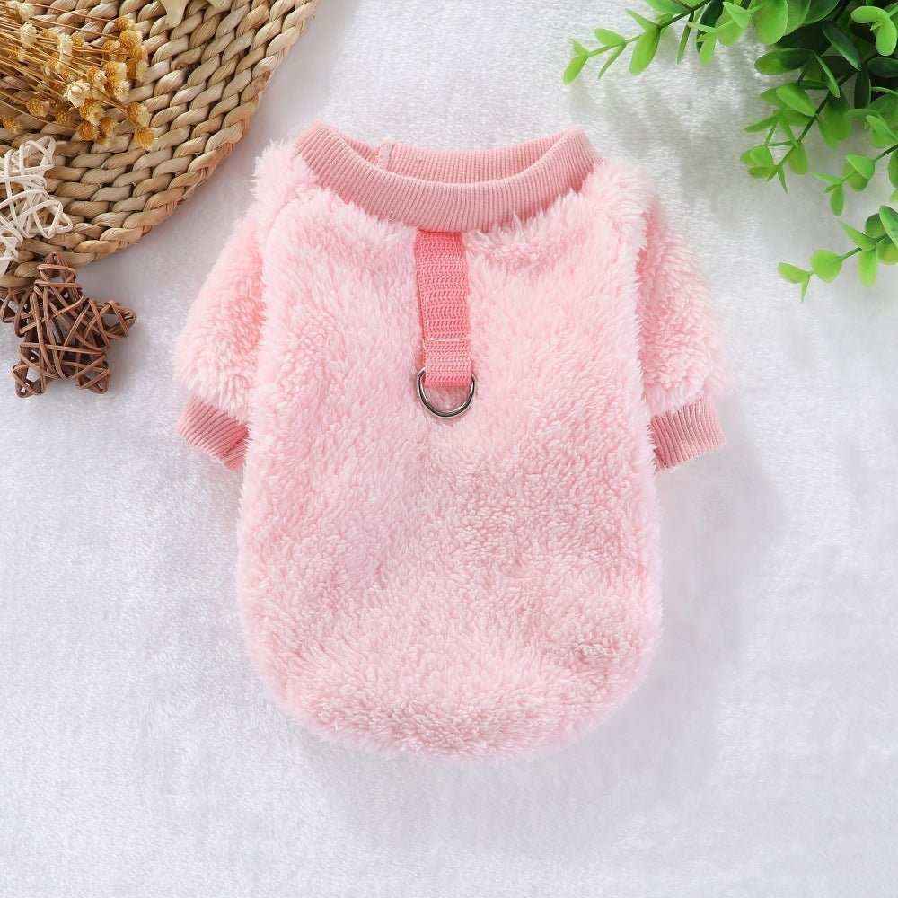 Soft pink fleece dog sweater with ribbed collar and sleeve cuffs, and D-ring leash attachment
