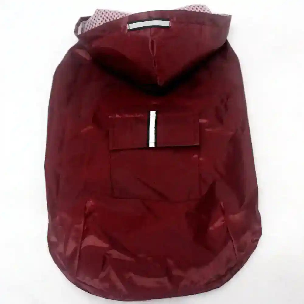 Maroon lightweight dog raincoat with hood and back pocket featuring reflective strip