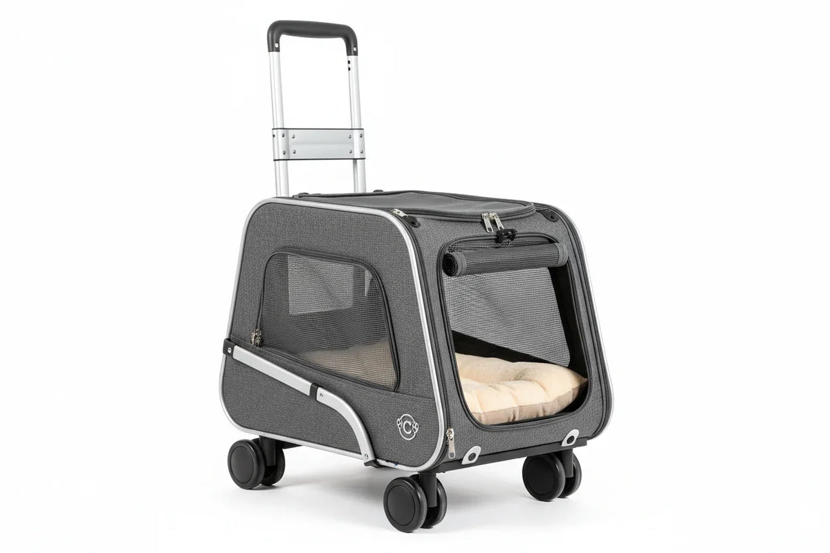 Gray pet trolley carrier with mesh windows, cushioned bed inside, and retractable handle on wheels