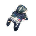 Camouflage dog winter jacket with hood, Union Jack patch, and white flame design on navy blue