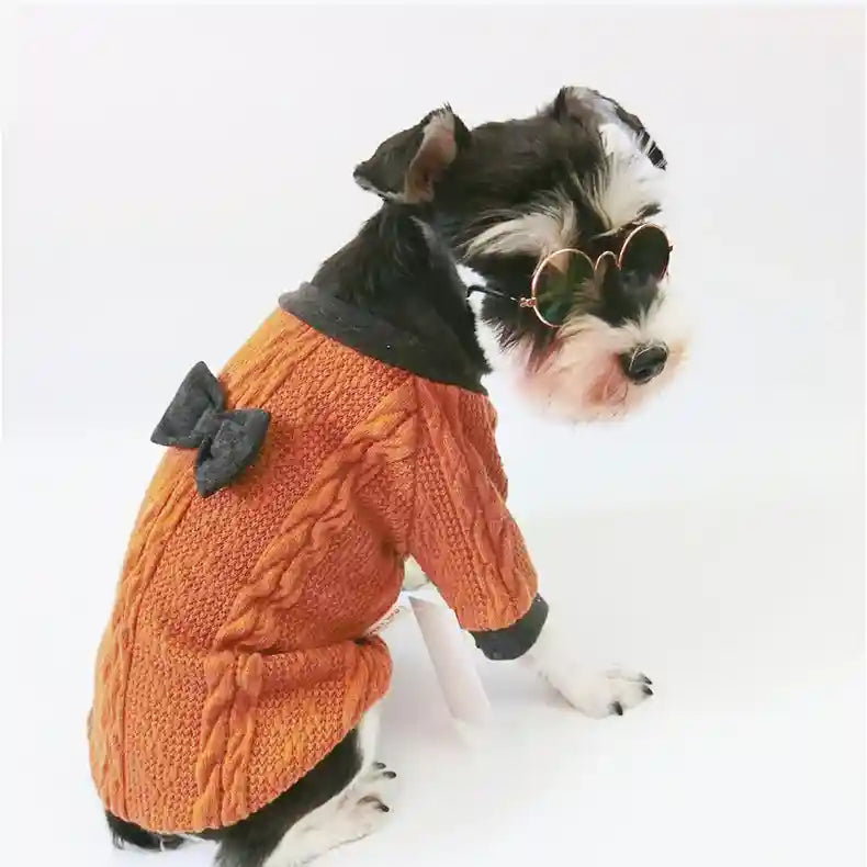 赤いリボン付き犬用セーター - 編み込みデザイン