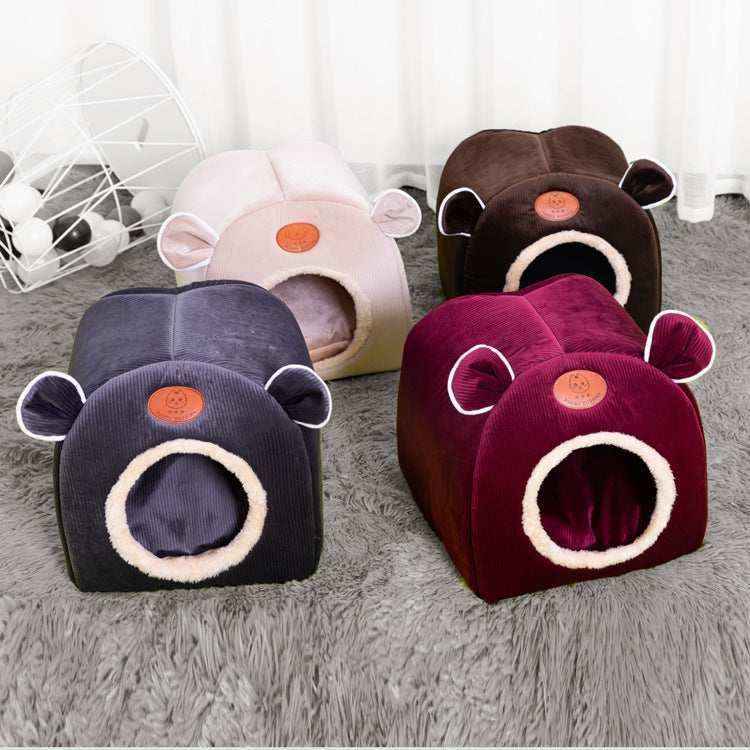 Casetta rettangolare per cuccioli "Happy Puppies" con orecchie decorative e ingresso tondo. Realizzata in velluto artico e corduroy per massimo comfort.