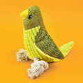 Yellow and green plush bird dog toy with rope legs on orange background