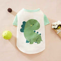 Cute baby t-shirt with green dinosaur print and mint green sleeves on beige background